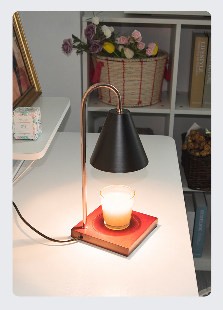 Elegant black flameless candle warmer lamp, adding sophistication and warmth to your space with its modern design.