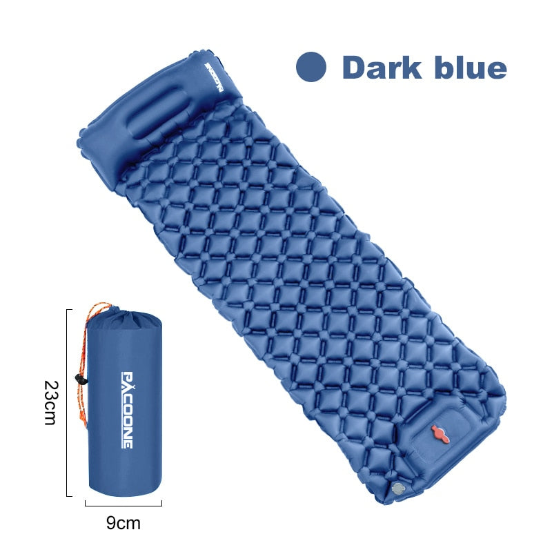 Dark blue camping mattress offering compact and cushioned surface for restful nights in the great outdoors.